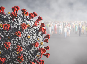 A close-up of covid virus over a background of people