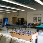 Cafeteria featuring a pool table, foozball table, and ping pong table