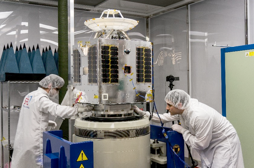 SFL researchers working on their equipment