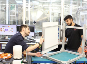 Dumitru Diaconu, head of mechanical engineering at SFL, and Alexandre Florio (UTIAS MASc candidate) test a 3D-printed prototype of the hinges that will allow the solar wings of NASA’s StarBurst satellite mission to deploy and lock into position
